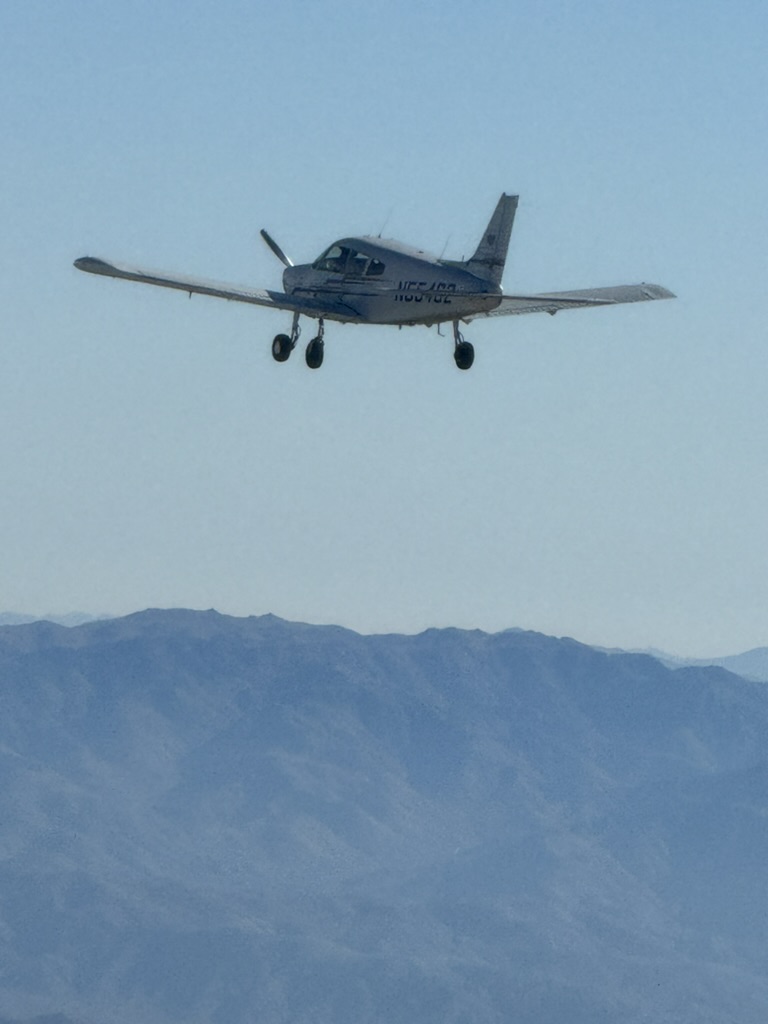 RPFC aircraft flying over Southern California mountains