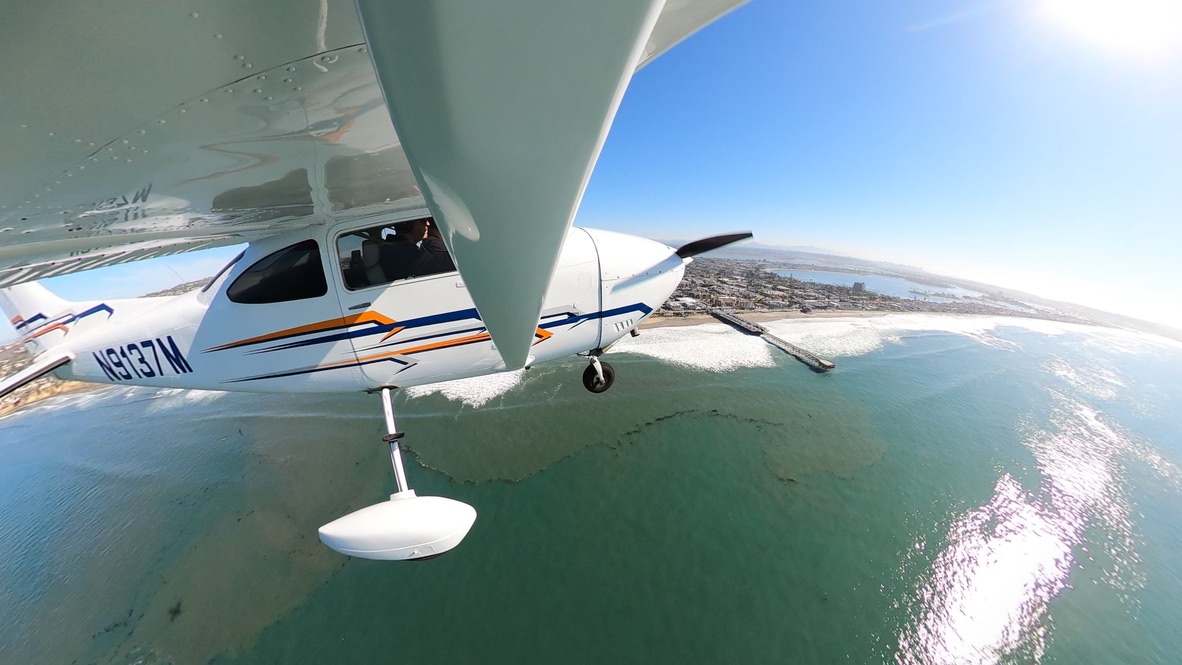 RPFC Cessna N9137M flying over the Southern California coast
